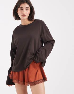 Miss Selfridge - Mini-short en satin avec bordures en dentelle - Rouille-Cuivre