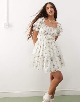 Miss Selfridge - Minikleid in Blau mit Korsett-Oberteil und Blumenprint-Bunt