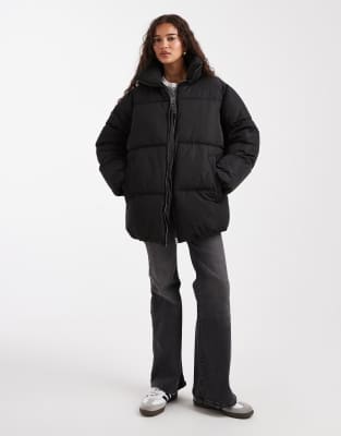 Miss Selfridge - Mittellange Pufferjacke in Schwarz