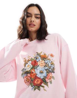 Miss Selfridge - Oversize-Sweatshirt in Blassrosa mit Blumen-Grafikprint