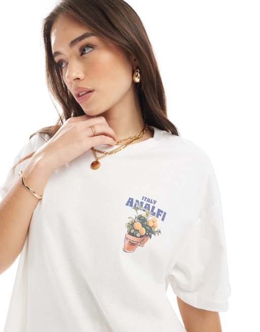 売れ筋商品|||セルフエスティーム カットソー トップス レディース Juniors' Amalfi Coast Graphic-Print T-Shirt Egret Amalfi Coast Oversized Graphic Tee | Indie and Isla