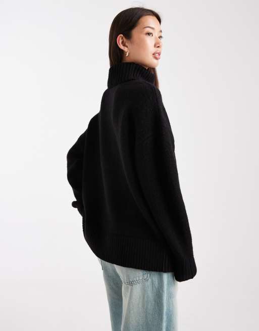 Miss Selfridge oversized roll neck slit hem sweater in black