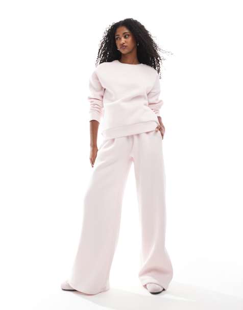 Miss Selfridge - Pantalon de jogging d'ensemble à imprimé logo en relief et chevilles resserrées - Rose - view 1