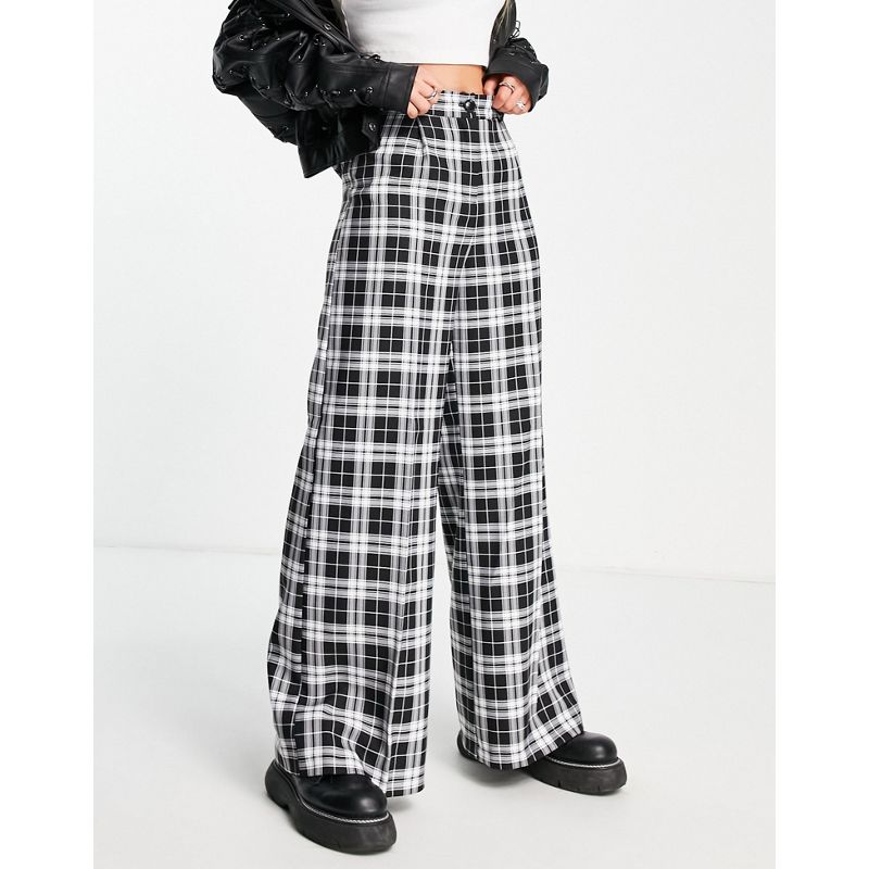 Pantaloni e leggings Pantaloni con fondo ampio Miss Selfridge - Pantaloni a fondo ampio neri e bianchi a quadri