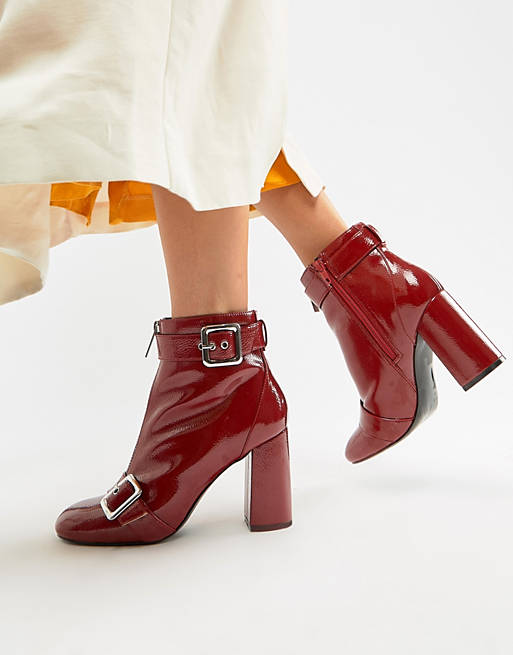 Miss Selfridge patent heeled boots with buckle detail in red