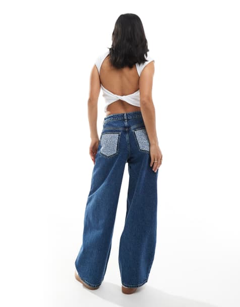 Miss Selfridge Petite – Baggy Jeans in blauer Waschung mit geblümten Patches - view 1