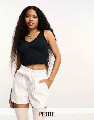 entry faux leather belted shorts in ivory-White