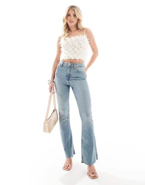 Miss Selfridge Petite - Jeans med svaj og hjertelommer i slidt vask - view 1