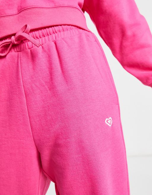 Miss Selfridge Petite lounge slim sweatpants with emb in pink | ASOS
