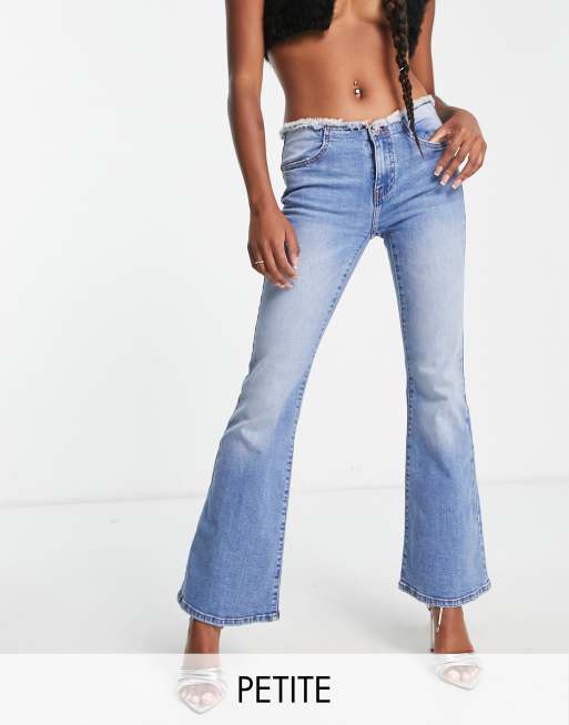 Miss Selfridge Petite low rise raw waistband flare jeans in mid wash blue