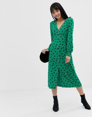 green and black spot dress