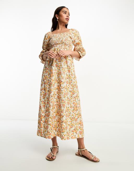 Miss Selfridge – Pomarańczowa marszczona sukienka midi z bawełny i lnu w drobny wzór