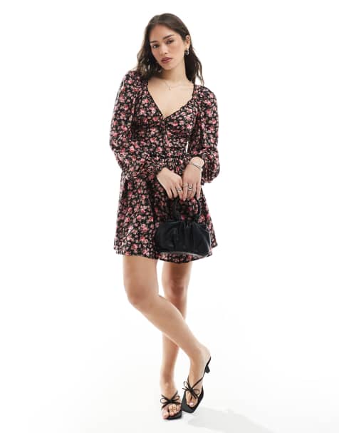 Miss Selfridge - Robe rétro courte à volants avec lien à l'avant et imprimé roses - view 1