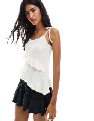 ruffle tie longline asymmetric top in cream-White