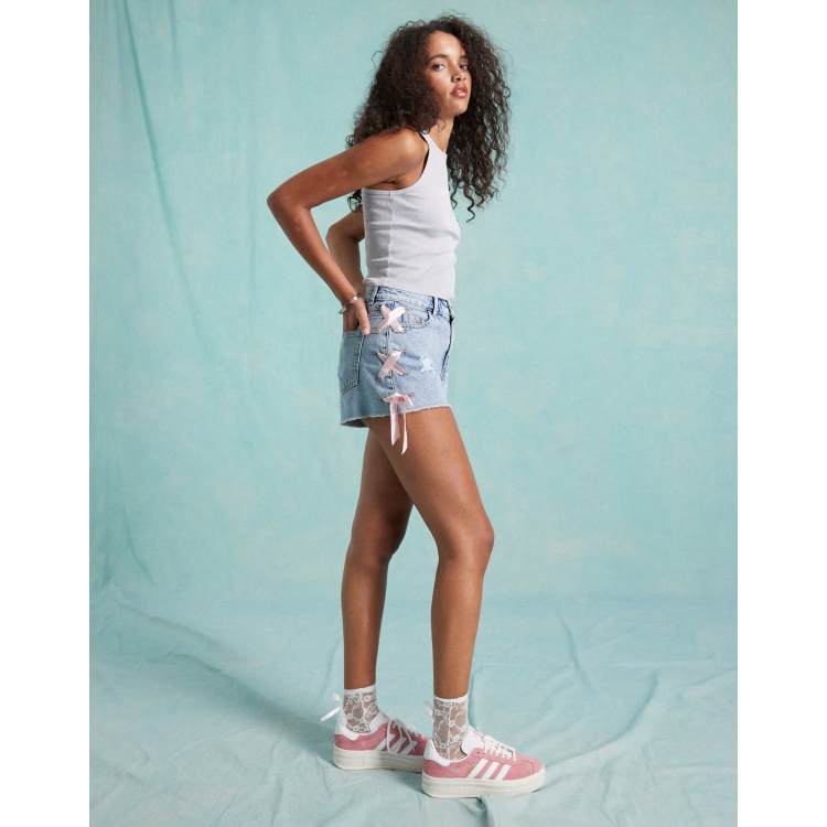 Miss Selfridge satin contrast lace up bow detail denim short in mid blue wash