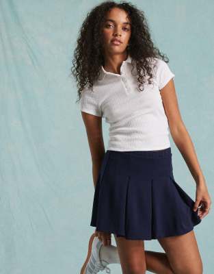 scalloped collar polo top in white