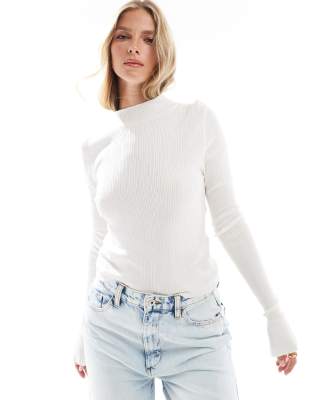 sheer knit funnel neck long sleeve top in cream-White