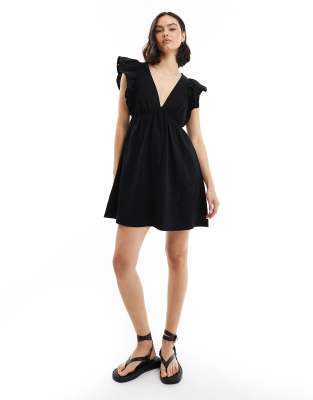 smock mini dress with eyelet sleeves in black