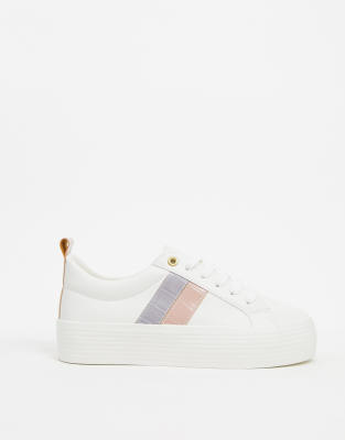 white sneakers with pink stripe