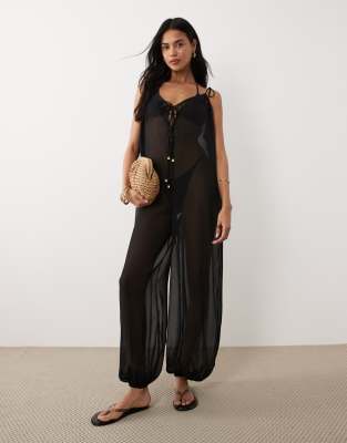 Strand-Jumpsuit aus Chiffon in Schwarz mit Ballonsaum Schwarz S