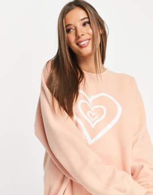 Miss Selfridge - Sweatshirt in Apricot mit Herzmotiv-Orange