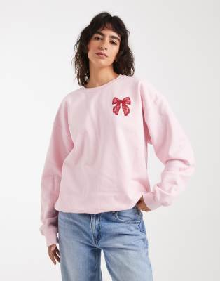 Miss Selfridge - Sweatshirt in Rosa mit Schleifen-Grafik im Spitzen-Design