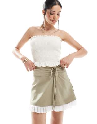 Miss Selfridge tailored ruffle hem mini skirt in olive-Black