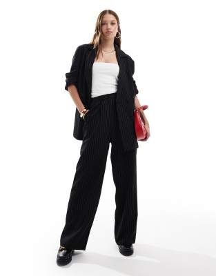 tailored straight leg pants in black and white pinstripe