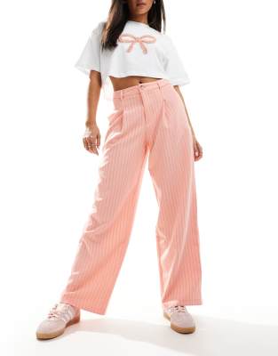 tailored wide leg pants in pink pinstripe