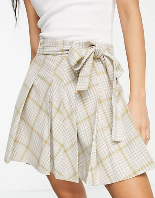 Miss Selfridge tie front pleated kilt mini skirt in stone check