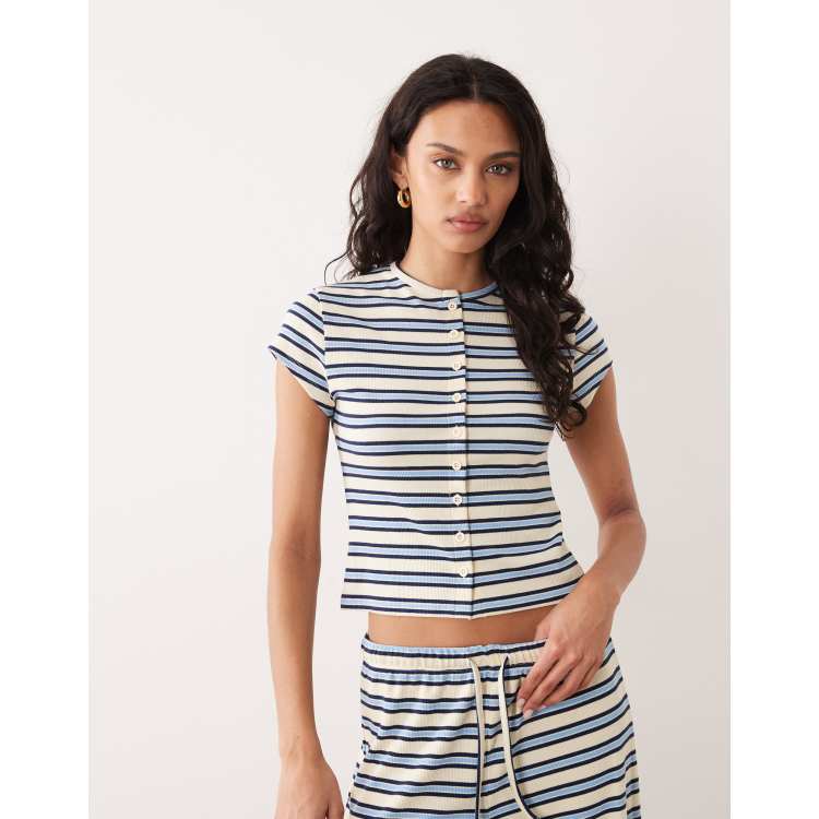 Rhythm - Top a maniche corte blu a righe in maglia in coordinato