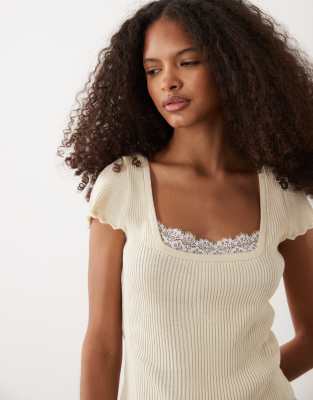 Top en maille avec ourlet à basque et bordures dentelle - Babeurre-noir M