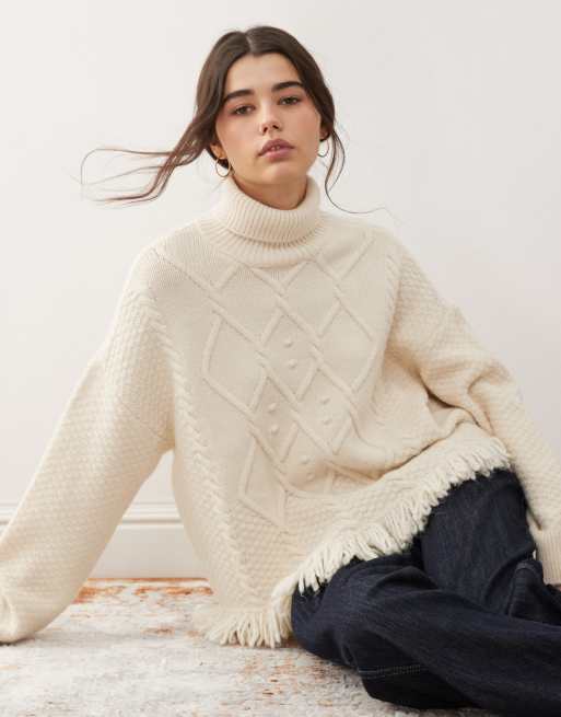 Miss Selfridge turtle neck cable jumper with fringe | ASOS
