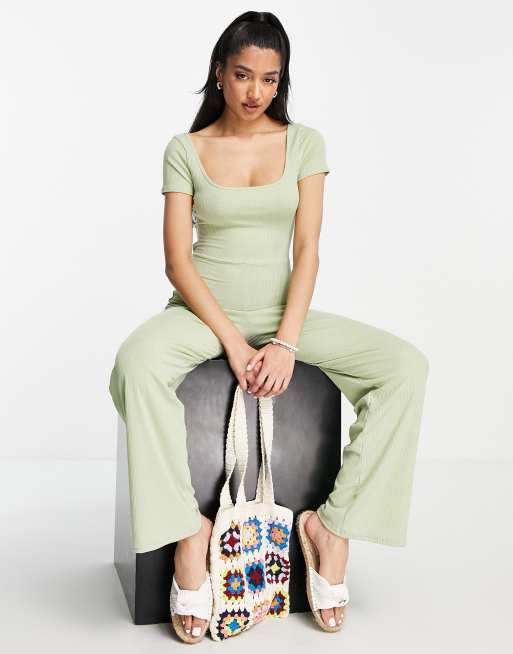 Miss Selfridge - Tuta jumpsuit a fondo ampio aperta sul retro a coste verde