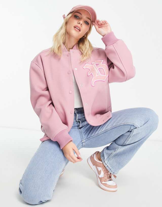 Miss Selfridge varsity large badge bomber jacket in pale pink