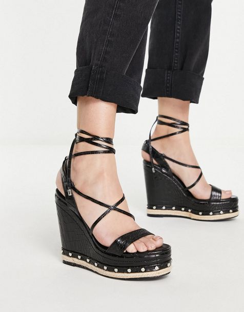 ASOS DESIGN flip flops with angular wedge sole in black - ShopStyle
