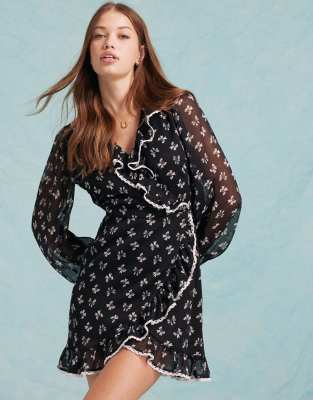 wrap mini tea dress in bow print-Black