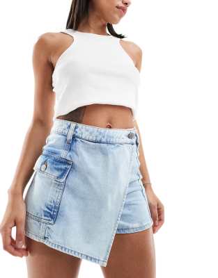 wrap over denim skort in mid blue wash