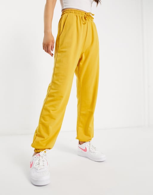 Missguided 90s oversized tie jogger in yellow ASOS