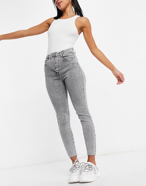 Missguided aysmmetric button jeans in acid wash