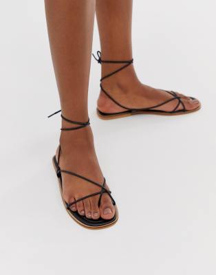 black ankle tie flat sandals