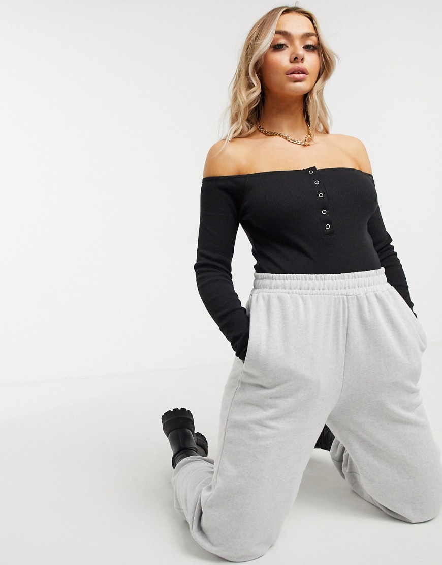Missguided basics long sleeve ribbed bodysuit with button detail in black