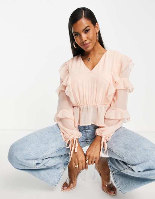 Missguided - Blusa con fondo peplo con volant in rosa