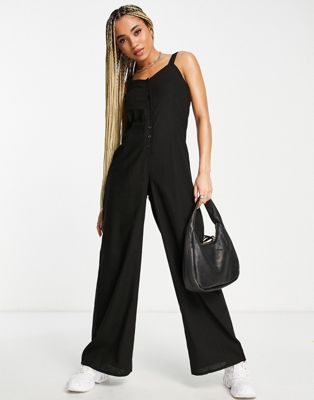 Missguided button front strappy jumpsuit in black