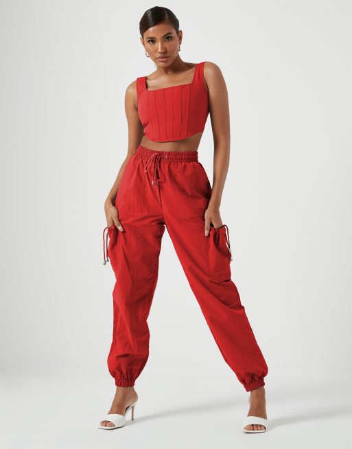orange stacked sweatpants