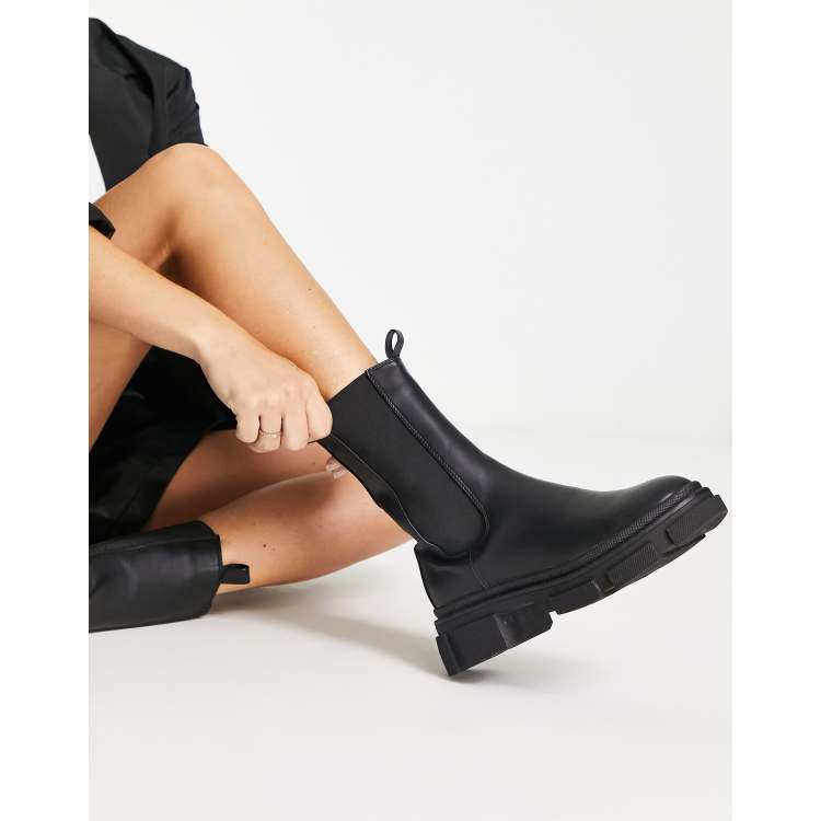 Missguided chunky pull on ankle boots in black faux leather ASOS