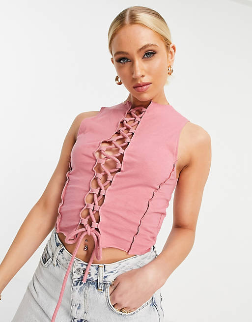 Missguided contrast stitch lace up crop top in pink