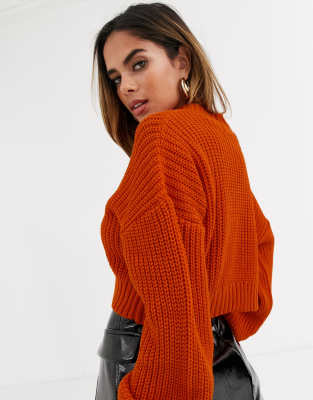 orange knitted jumper