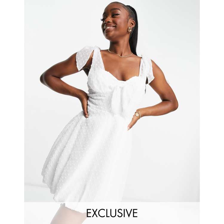 Missguided dobby tie front dress in white ASOS