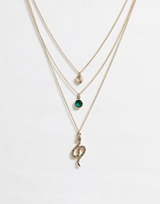 Missguided – Guldfärgat halsband i flera rader med orm- och smaragdhängen